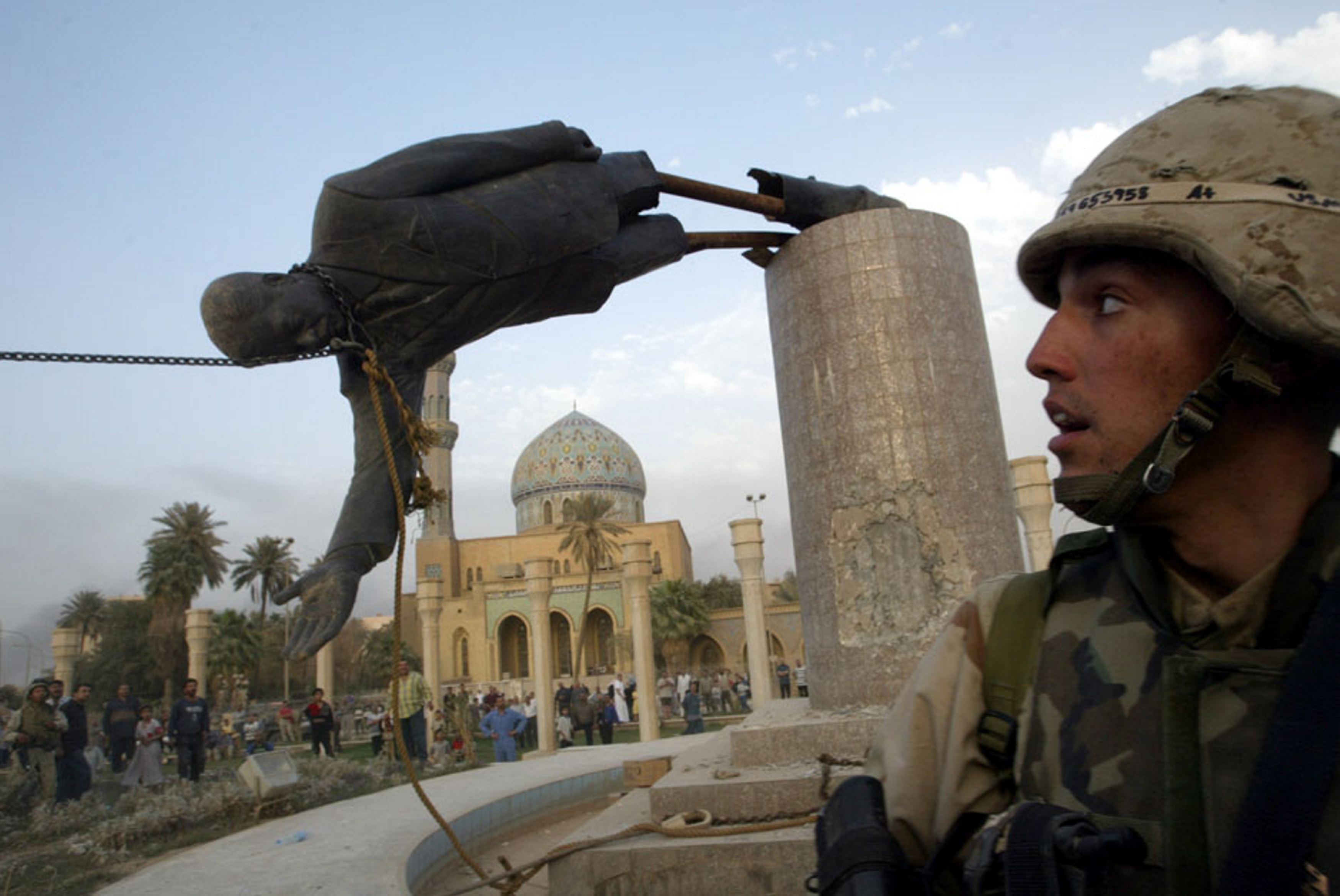 Statue of Saddam Hussein falls
