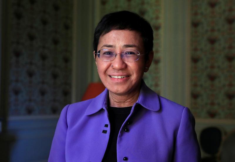 Maria Ressa, journalist and CEO of the Rappler news website, poses before a news conference to launch a commission to draft an "International Declaration on Information and Democracy" hold by Human rights group Reporters Without Borders in Paris, France, September 11, 2018. REUTERS/Gonzalo Fuentes