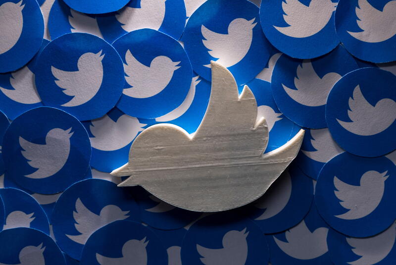 A 3D-printed Twitter logo on non-3D printed Twitter logos is seen in this picture illustration taken April 28, 2022. REUTERS/Dado Ruvic/Illustration