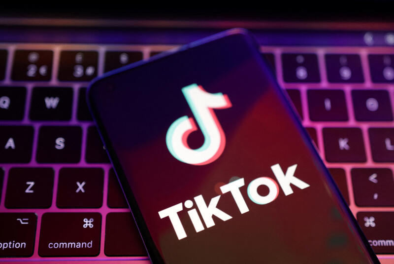 TikTok logo on phone screen