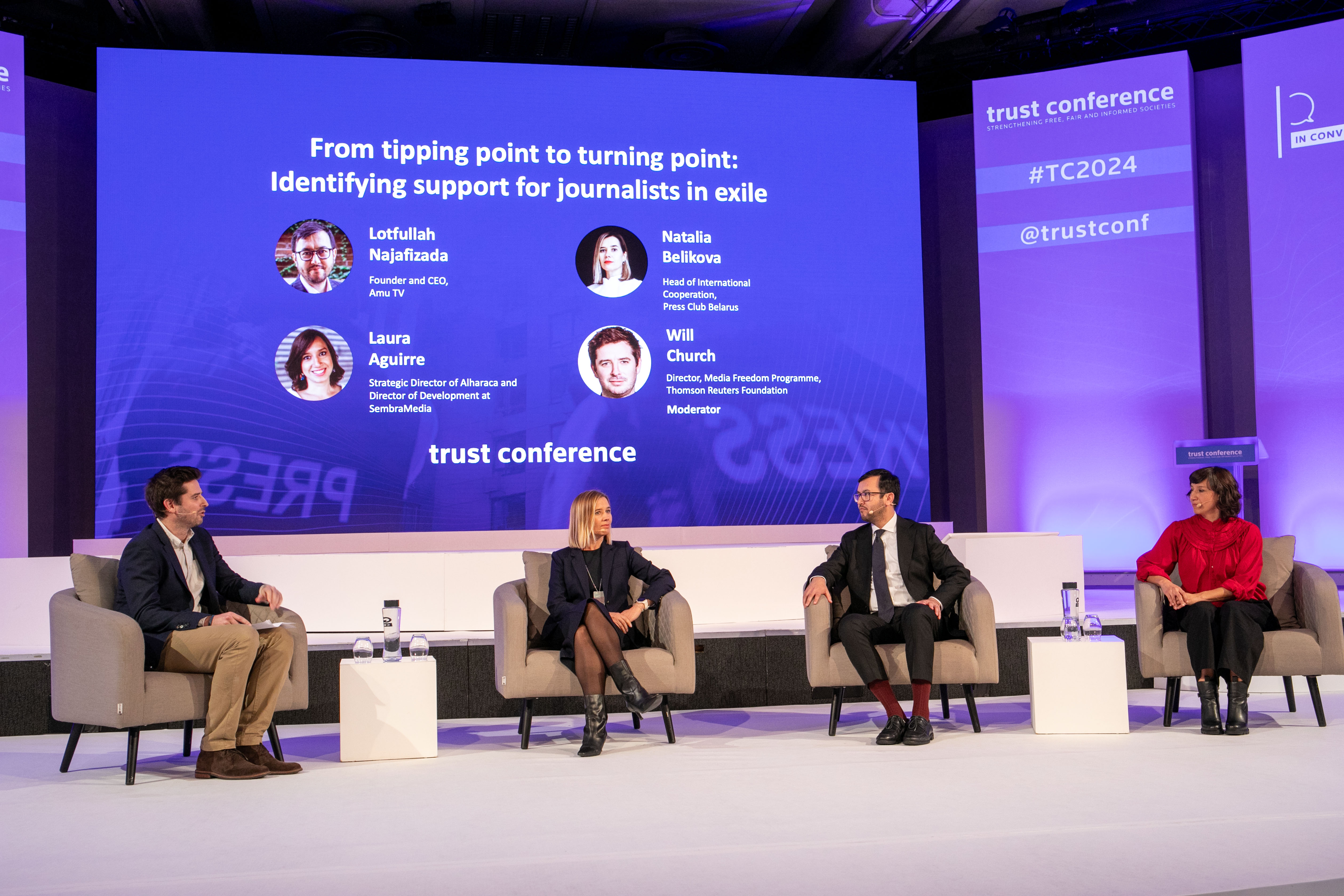 Will Church, Natalia Belikova, Lotfullah Najafizada, and Laura Aguirre speaking at Trust Conference 2024, the Thomson Reuters Foundation annual flagship forum