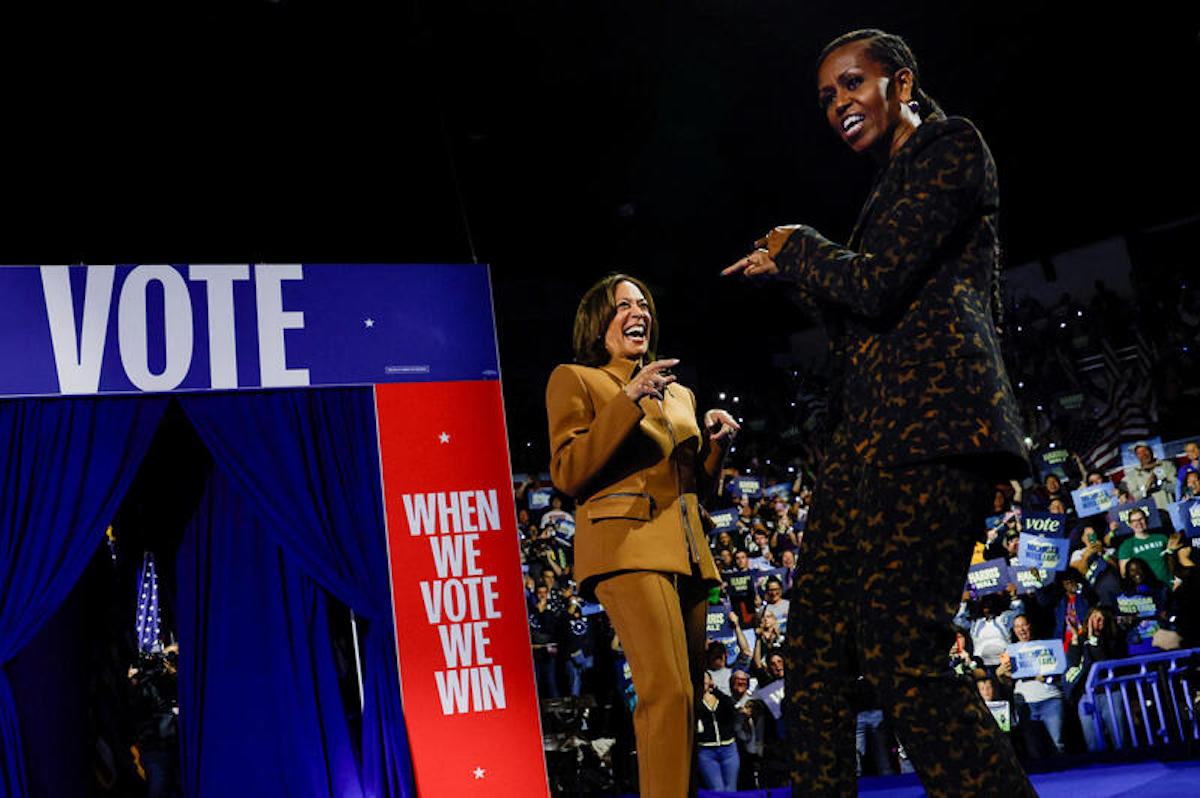 Kamala Harris and Michelle Obama at a campaign event in Kalamazoo, Michigan. REUTERS/Evelyn Hockstein