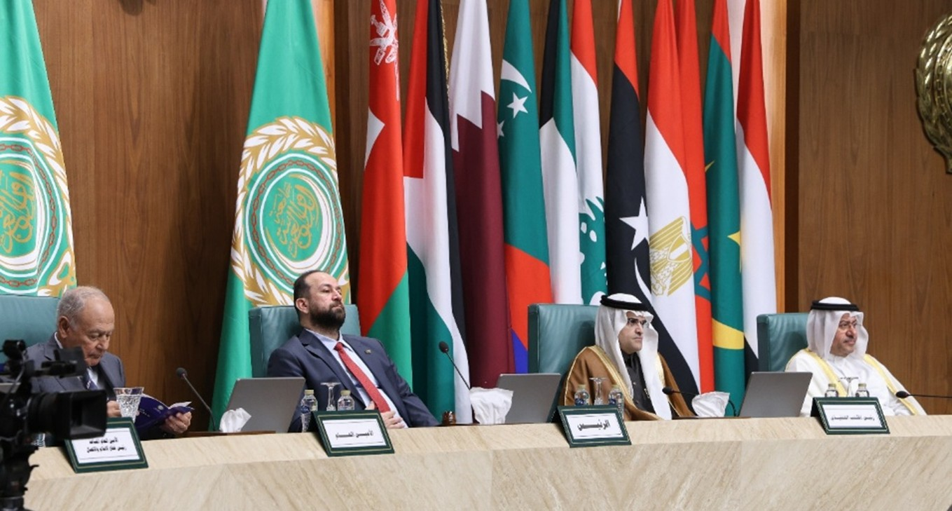 Syrian Information Minister Hamza al-Mustafa (second from left) seated with other delegates during the Arab Information Ministers Council meeting on November 26, 2025, marking Syria’s first high-level participation after regaining its seat in the Arab League.