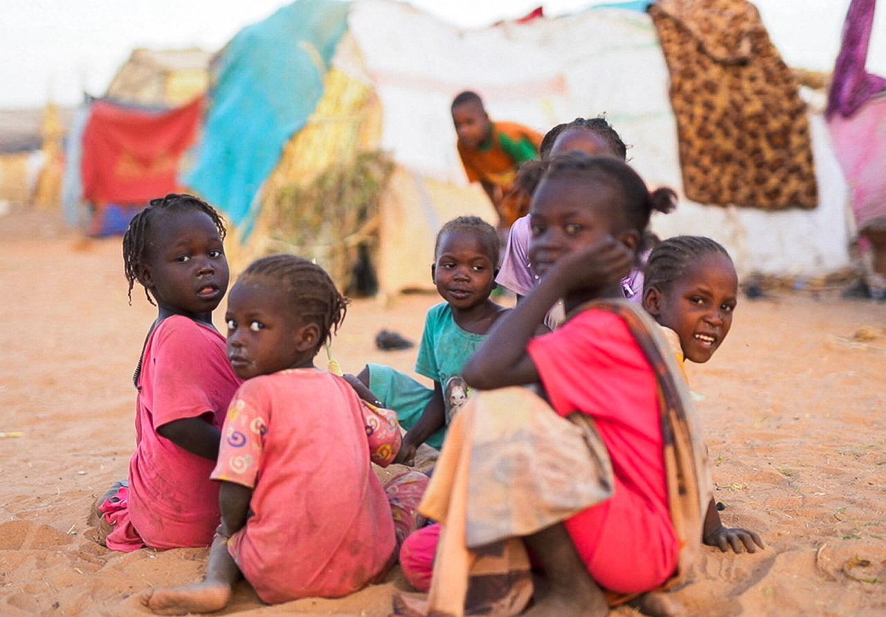 Displaced Sudanese children who fled with their families during violence in al-Fashir, sit inside a camp shelter, amid ongoing clashes between the paramilitary Rapid Support Forces (RSF) and the Sudanese army, in Tawila, North Darfur, Sudan