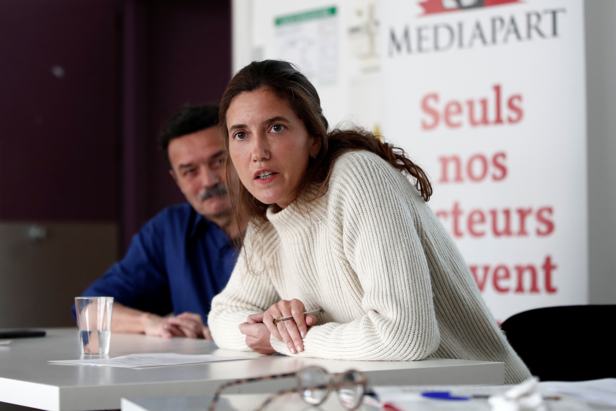 French journalist, writer and co-founder of the free and independent online media outlet Mediapart Edwy Plenel, and Mediapart journalist Carine Fouteau, attend the annual news conference at their office in Paris, France, March 12, 2019. REUTERS/Benoit Tessier