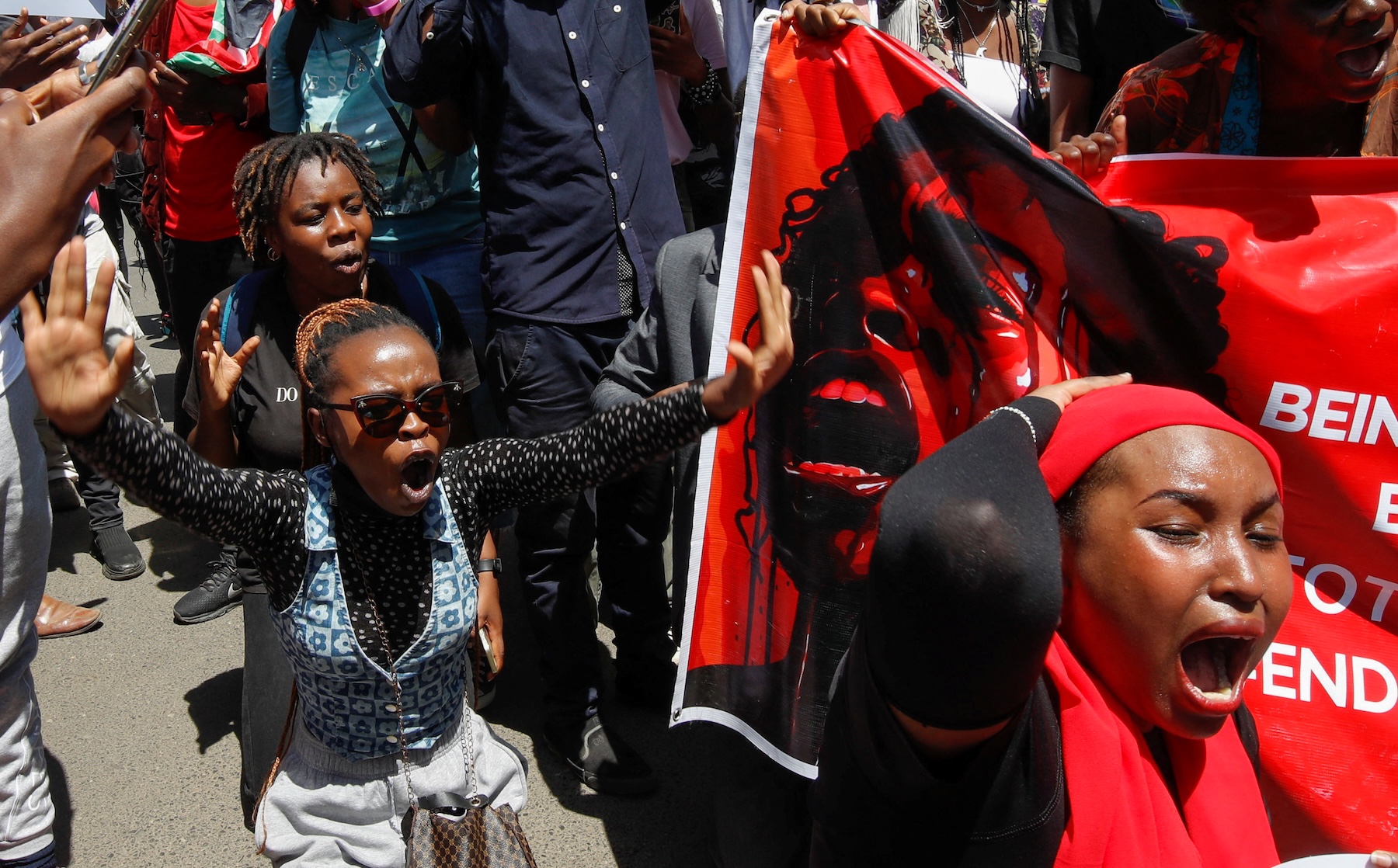Activists and civil society members participate in a nationwide march titled "End Femicide Kenya" to raise awareness about gender-based violence (GBV) and to pressure the Kenyan government to implement stricter laws and policies to combat this pervasive issue, in downtown Nairobi, Kenya December 10, 2024. REUTERS/Monicah Mwangi
