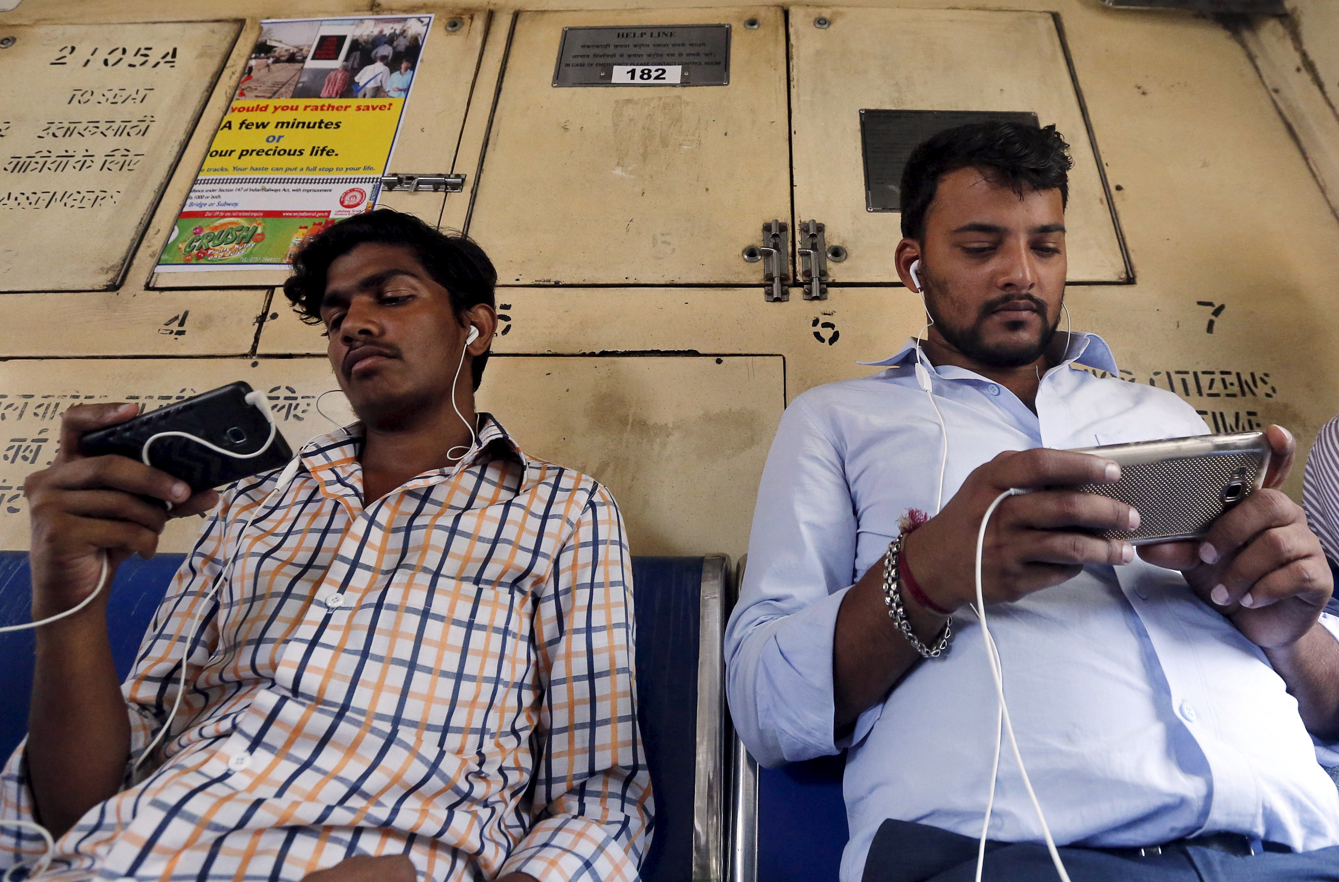 Men watching smartphones