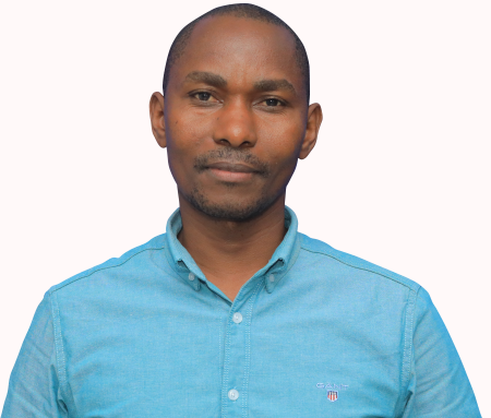 A professional photograph of a man wearing a blue shirt in front of a white background.