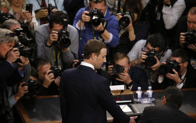 Photo of Mark Zuckerberg with photographers