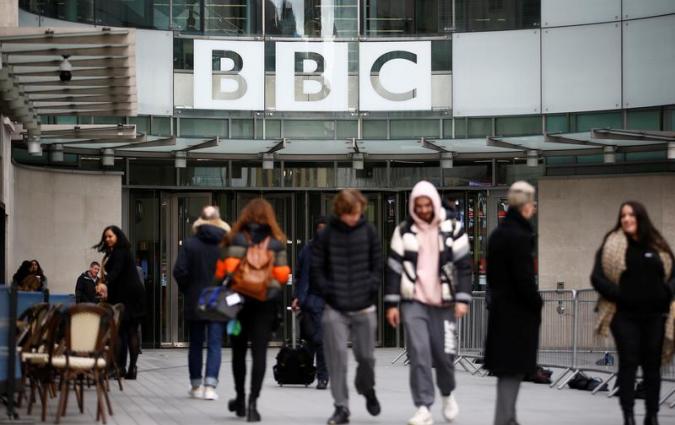 Pedestrians walk past BBC Broadcasting House in London REUTERS/Henry Nicholls