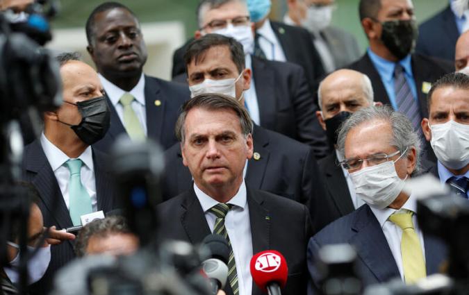 Brazil's President Jair Bolsonaro speaks with journalists after a meeting with President of Brazil's Supreme Federal Court Dias Toffoli, amid the coronavirus disease (COVID-19) outbreak, at the Supreme Federal Court in Brasilia, Brazil May 7, 2020. REUTERS/Adriano Machado