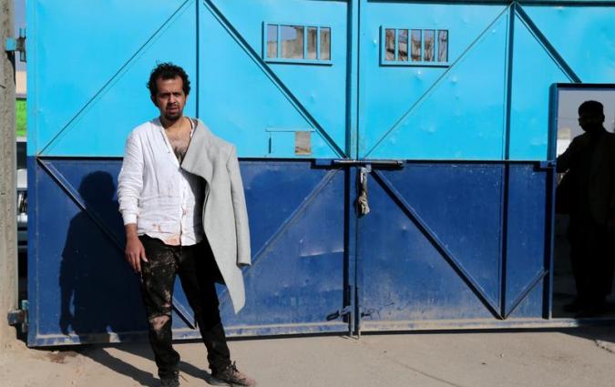 Pakistani journalist Taha Siddiqui, who escaped a kidnapping attempt, waits to be taken to the hospital after he made a statement to police in Rawalpindi, Pakistan January 10, 2018. REUTERS/Caren Firouz