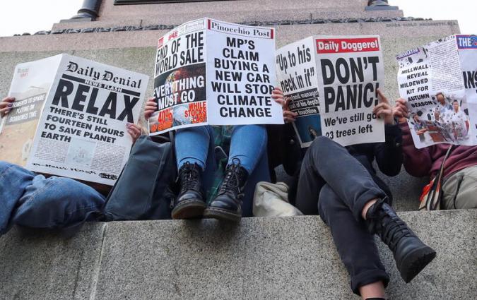 People demonstrate during the UN Climate Change Conference (COP26), in Glasgow, Scotland, Britain, November 7, 2021. REUTERS/Yves Herman