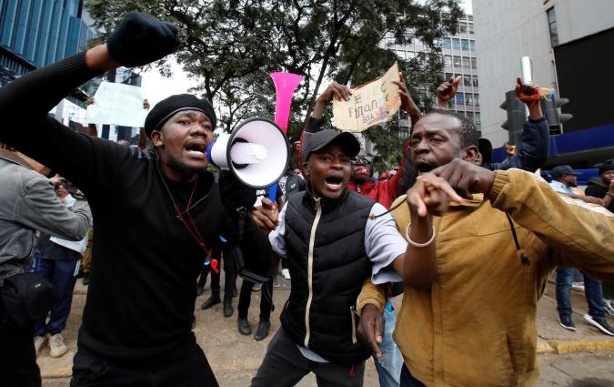 Protestors react during a demonstration against Kenya's proposed finance bill 2024/2025, in Nairobi, Kenya, June 20, 2024. REUTERS/Monicah Mwangi