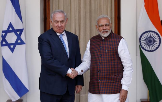 Israeli Prime Minister Benjamin Netanyahu shakes hands with his Indian counterpart Narendra Modi during a photo opportunity ahead of their meeting at Hyderabad House in New Delhi, India, January 15, 2018. REUTERS/Adnan Abidi