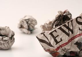crumpled up newspaper