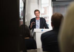 Nic Newman presenting at DNR launch in London