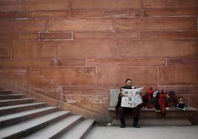Man reading newspaper