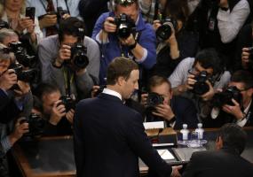 Photo of Mark Zuckerberg with photographers
