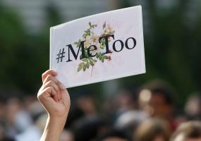 Woman holds #MeToo placard. Image: REUTERS/Issei Kato