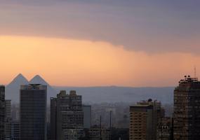 The Giza Pyramids are pictured in smog behind the Nile river and buildings in Cairo, Egypt June 8, 2017. REUTERS/Amr Abdallah Dalsh