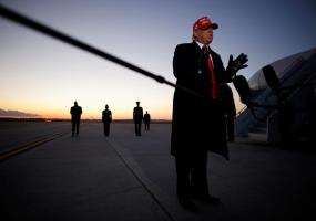 U.S. President Donald Trump speaks to the press after arriving at Charlotte Douglas International Airport in Charlotte, North Carolina, U.S., November 1, 2020. REUTERS/Carlos Barria
