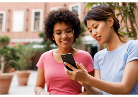 People looking at a smartphone
