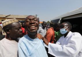 A man reacts as he receives a COVID-19 vaccine in Abuja, Nigeria. REUTERS/Afolabi Sotunde