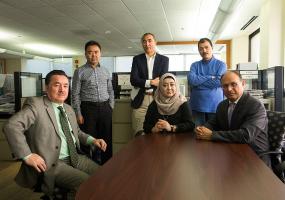 Shohret Hoshur (on the left) along with his colleagues at Radio Free Asia. | D. A. Peterson