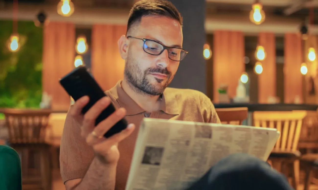 Man reading newspaper